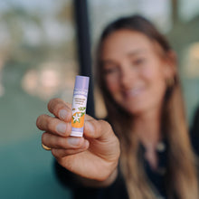 Load image into Gallery viewer, lavender orange lip balm lifestyle