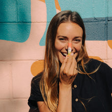 Load image into Gallery viewer, organic lip balm pink grapefruit lifestyle