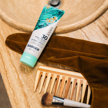 Load image into Gallery viewer, spf 30 daily mineral sunscreen lifestyle