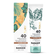 Load image into Gallery viewer, Badger brand sunscreen tube and packaging with tropical leaf design on a white background

