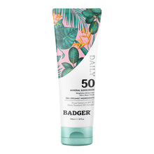 Load image into Gallery viewer, Badger sunscreen tube with tropical leaf design on a white background
