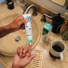 Load image into Gallery viewer, spf 30 face mineral sunscreen lifestyle
