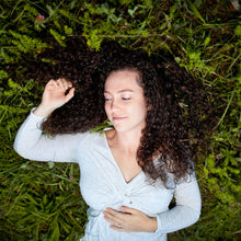 Load image into Gallery viewer, lavender massage oil organic aromatherapy in the grass
