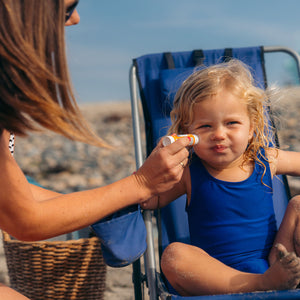 kids mineral sunscreen face stick SPF 35 beach scene